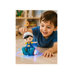A colorful 360° spinning stunt boy toy with flashing LED lights and music, designed for kids aged 3+, performing rotating motion on a flat surface.

