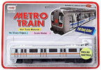 Silver metro train toy in retail blister packaging, with pull-back action label