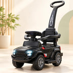 Black toddler ride-on push car with parental handle, safety rail, backrest, and illuminated headlights