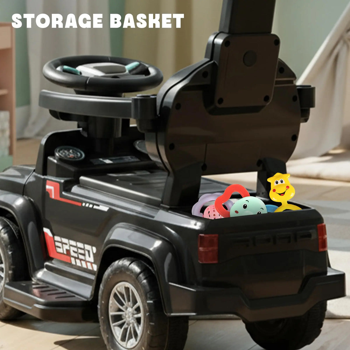 Black toddler ride-on car with rear storage basket holding toys