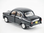 Rear view of black pull-back toy car with silver trim and detailed wheels
