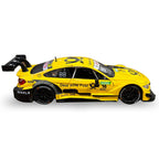 1:24 yellow die-cast BMW M4 DTM toy car, rear view with spoiler