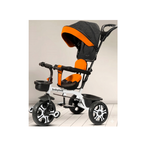 Orange kids tricycle with canopy and parent handle