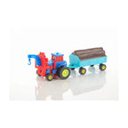 Friction powered tractor toy with trailer and logs.