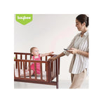Wooden baby cradle with swing feature