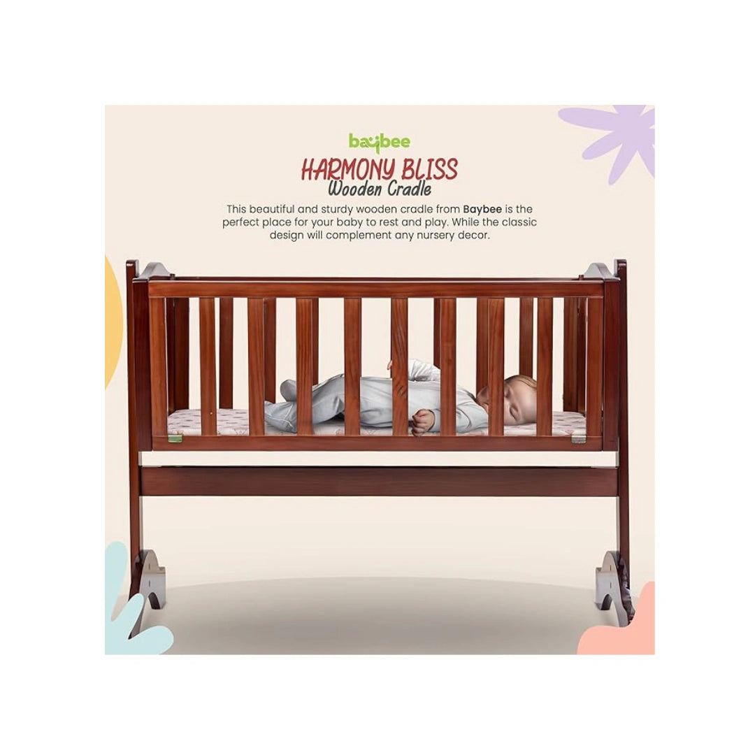 Wooden baby cradle with swing feature