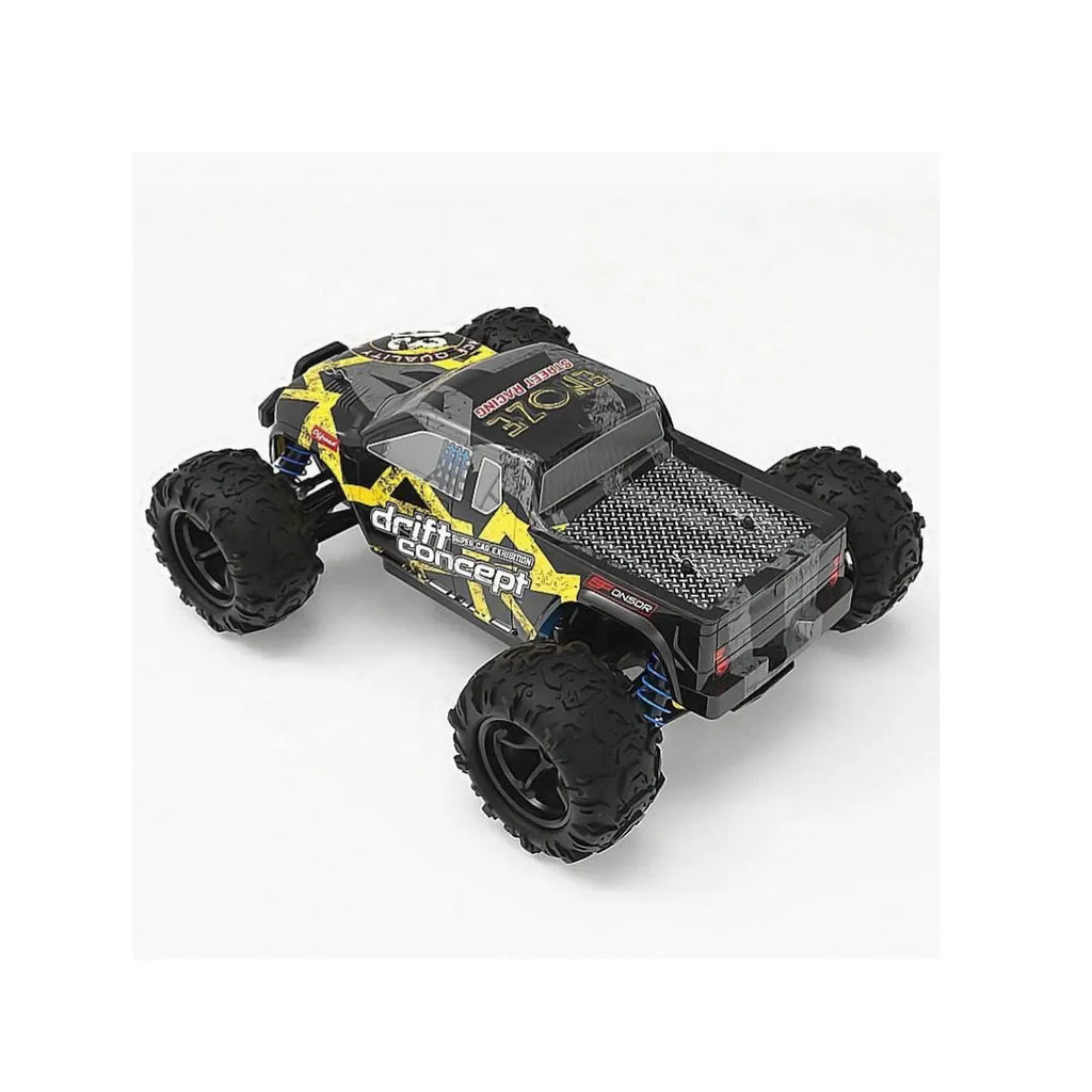 Remote control 4WD monster truck driving off-road on rough terrain.
