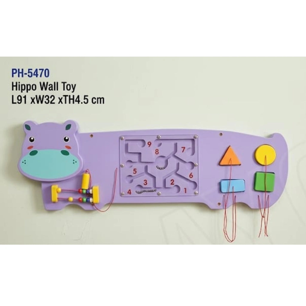 Kids playing wooden hippo activity board