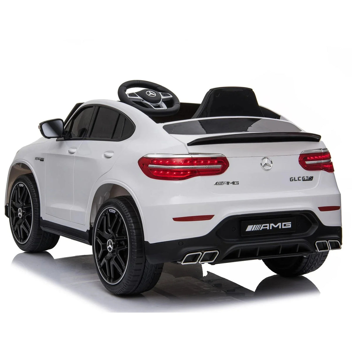 White Mercedes-Benz AMG ride-on car rear view with LED tail lights and AMGs badge
