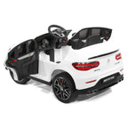 White Mercedes-Benz AMG ride-on car with open doors, rear lights, and black wheels