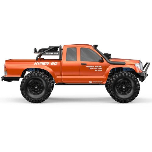 Orange RC rock crawler side profile with roof light bar and wide off-road tires