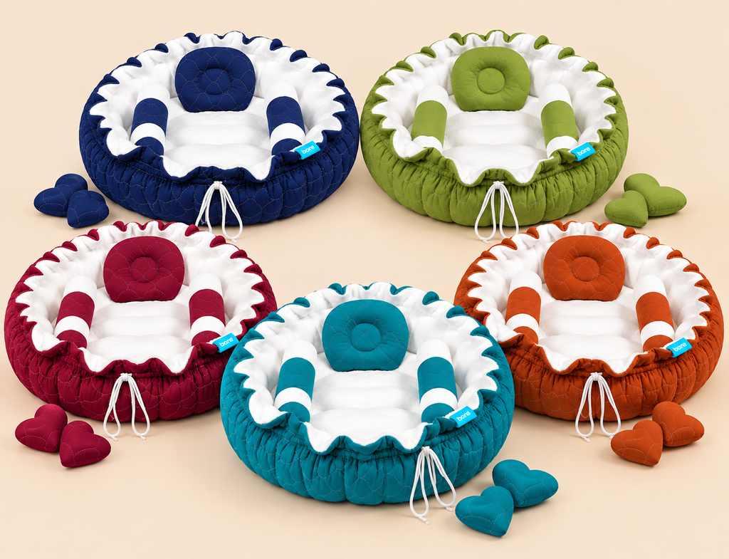 Set of round baby nest beds with mosquito nets in blue, green, red, orange