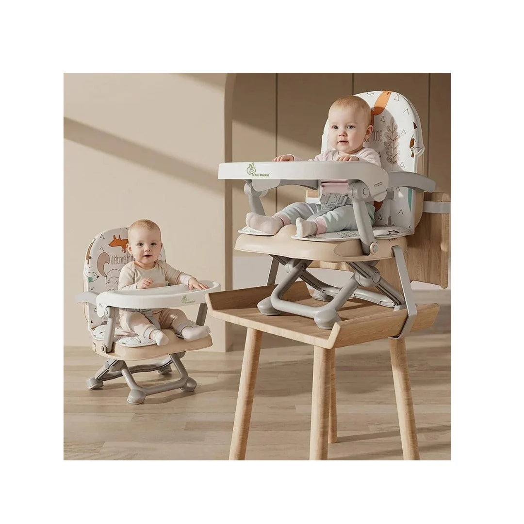 Baby booster chair with safety harness