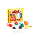Sliceable fruit cutting play set with toy knife and board.