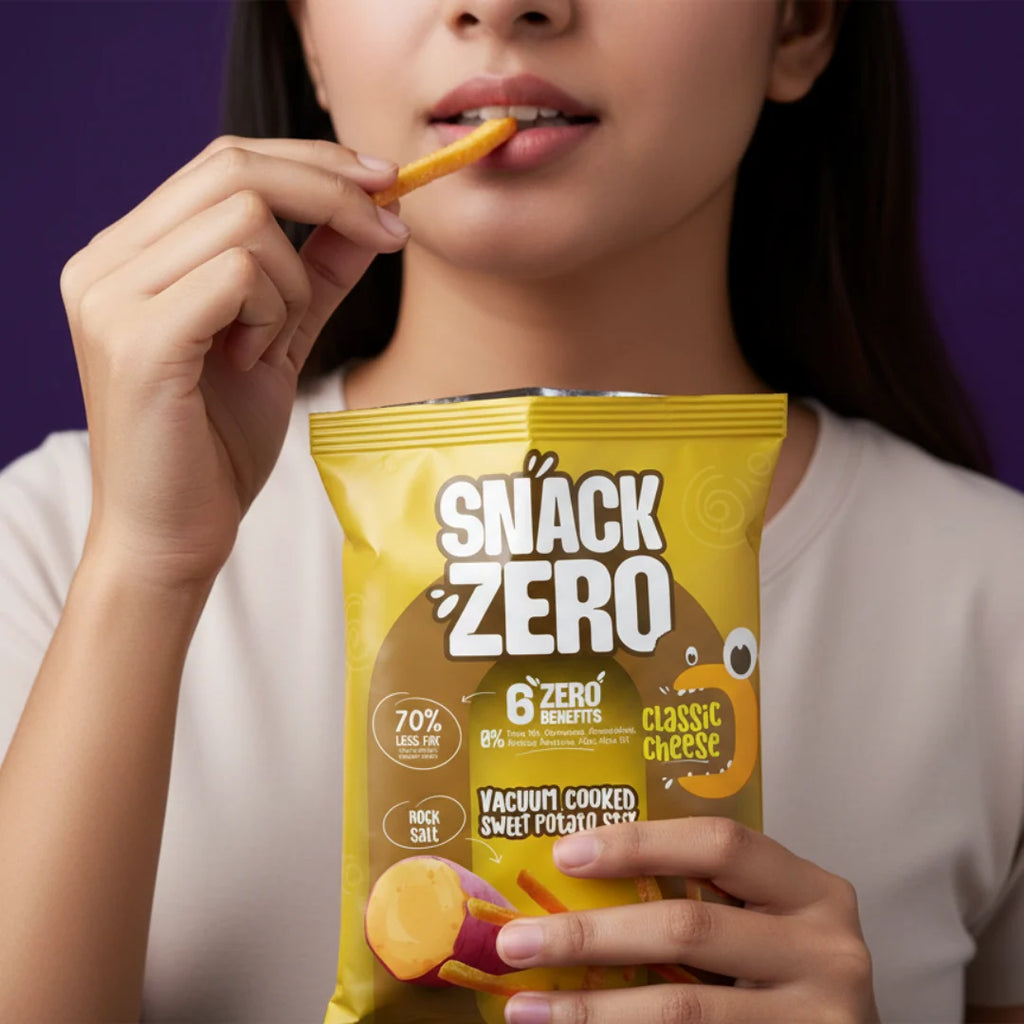 Snack Zero sweet potato stix classic cheese bag held by person, with a chip bite.