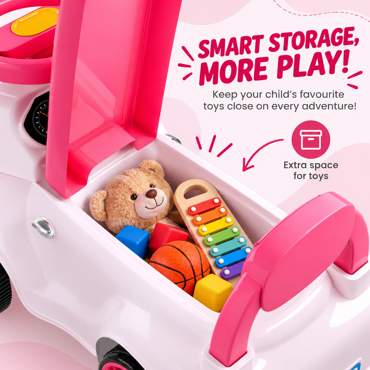 A close-up of a pink and white toy car with its hood open, showing colorful toys inside including a teddy bear, xylophone, basketball, and blocks. Promotional text reads 'SMART STORAGE, MORE PLAY!' and 'Extra space for toys'.