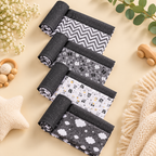 Printed cradle cloth set with dark gray borders and light bases, zigzag, clouds, stars