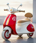 Red and white kids battery ride-on Vespa scooter with front headlight, beige seat, and wheels