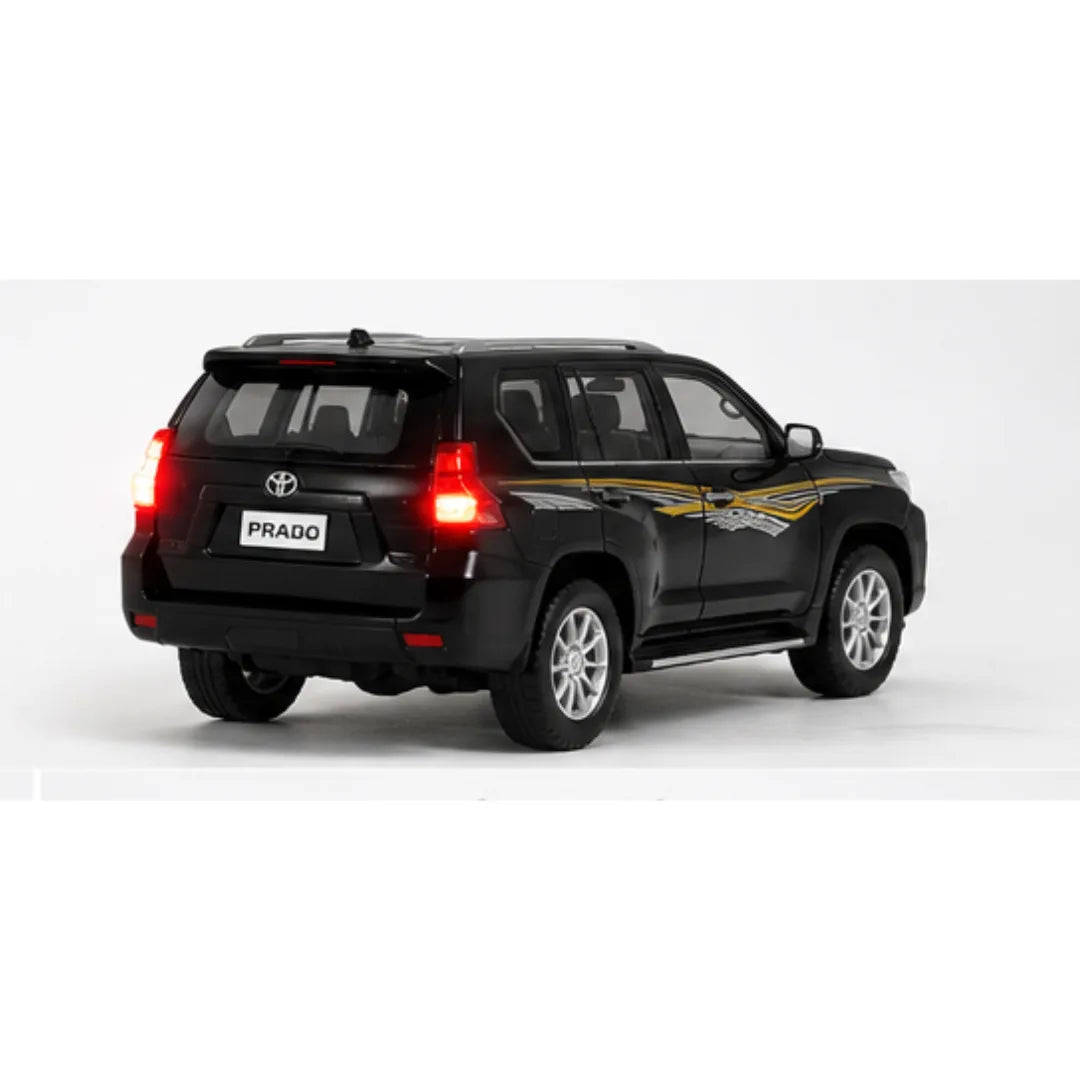 Toyota Land Cruiser Prado diecast toy car with lights, sound, and pull-back action