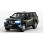 Toyota Land Cruiser Prado diecast toy car with lights, sound, and pull-back action