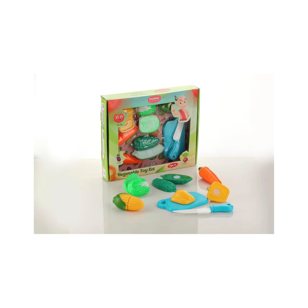 Sliceable vegetable cutting play set with toy knife and board.