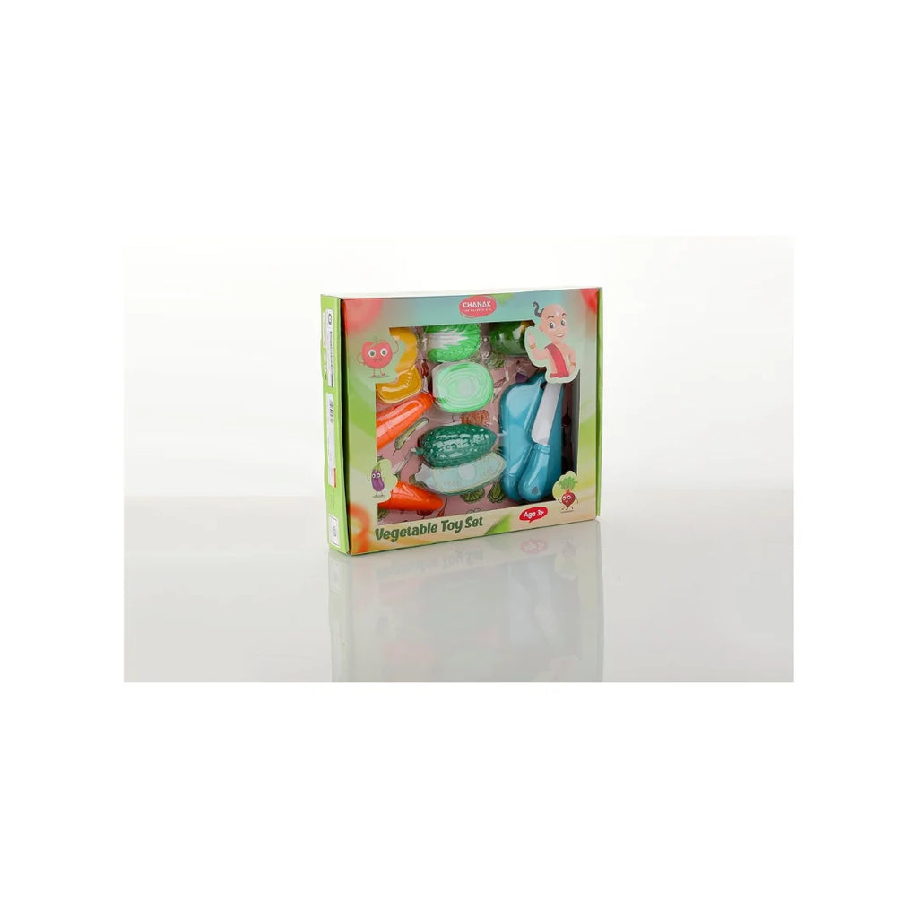 Sliceable vegetable cutting play set with toy knife and board.