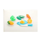 Sliceable vegetable cutting play set with toy knife and board.