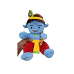Krishna plush doll with blue face, red pants, yellow sash, and peacock feather